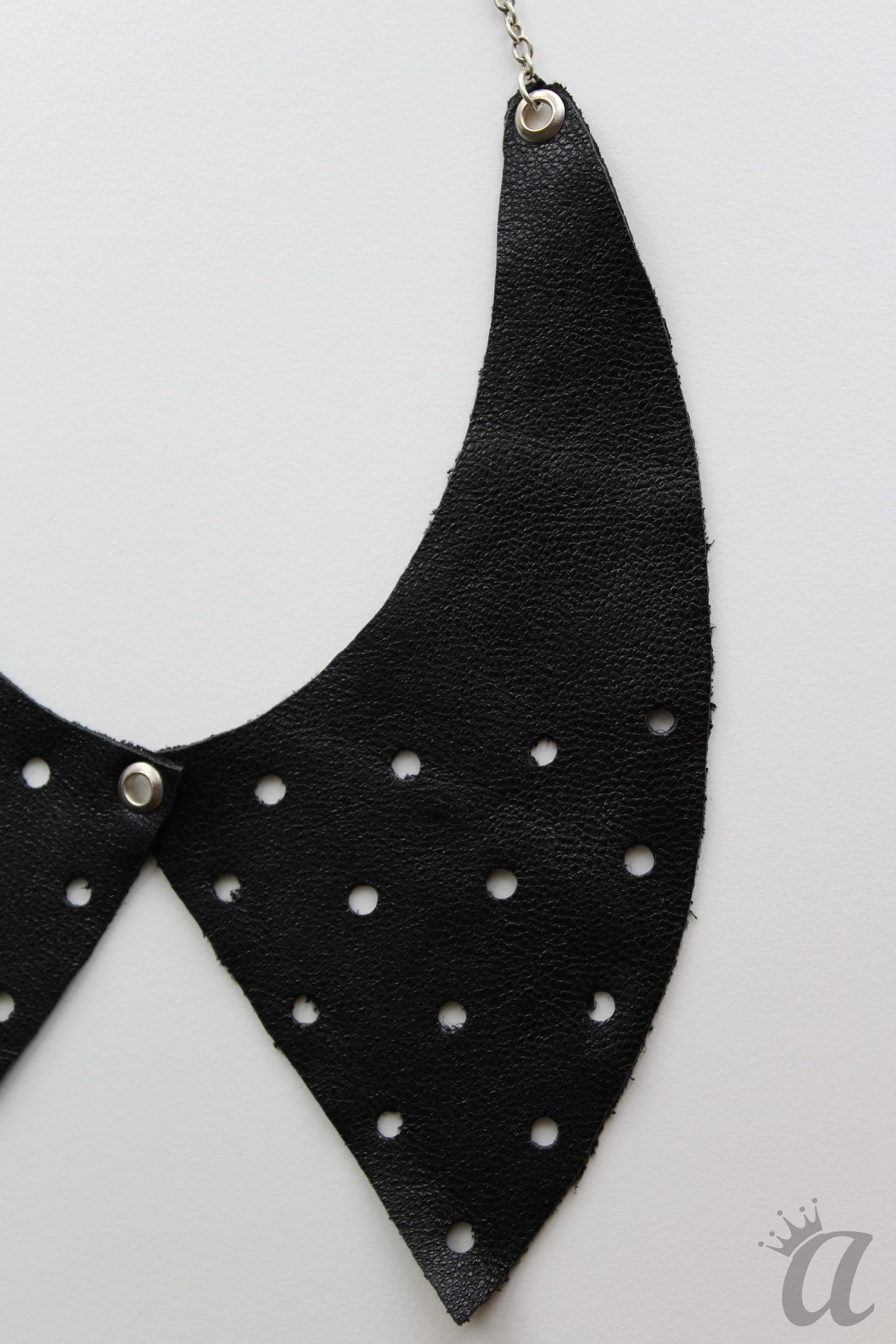 perforated black leather necklace (detail)