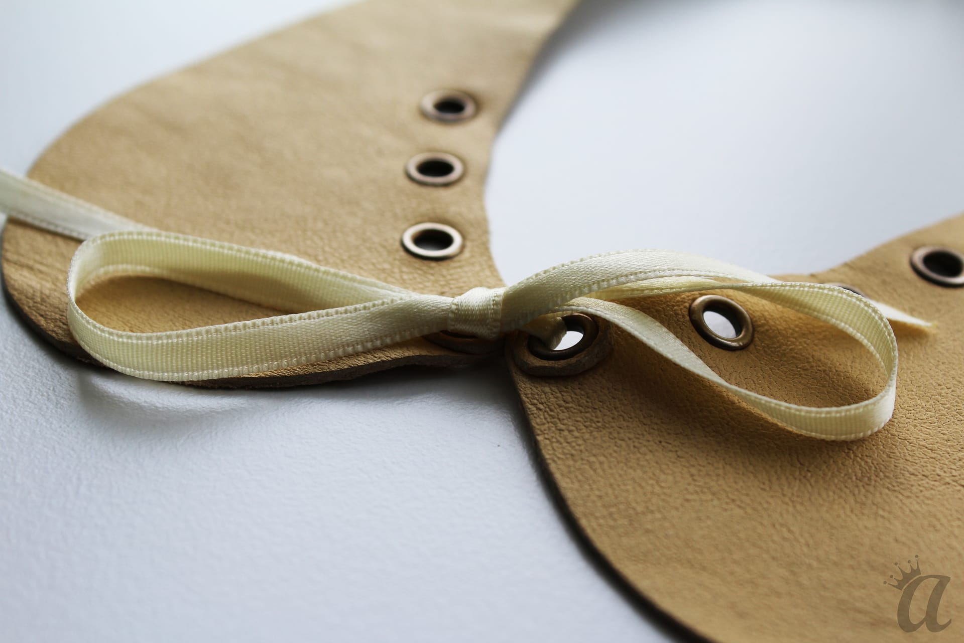 yellow leather necklace with bow (detail)