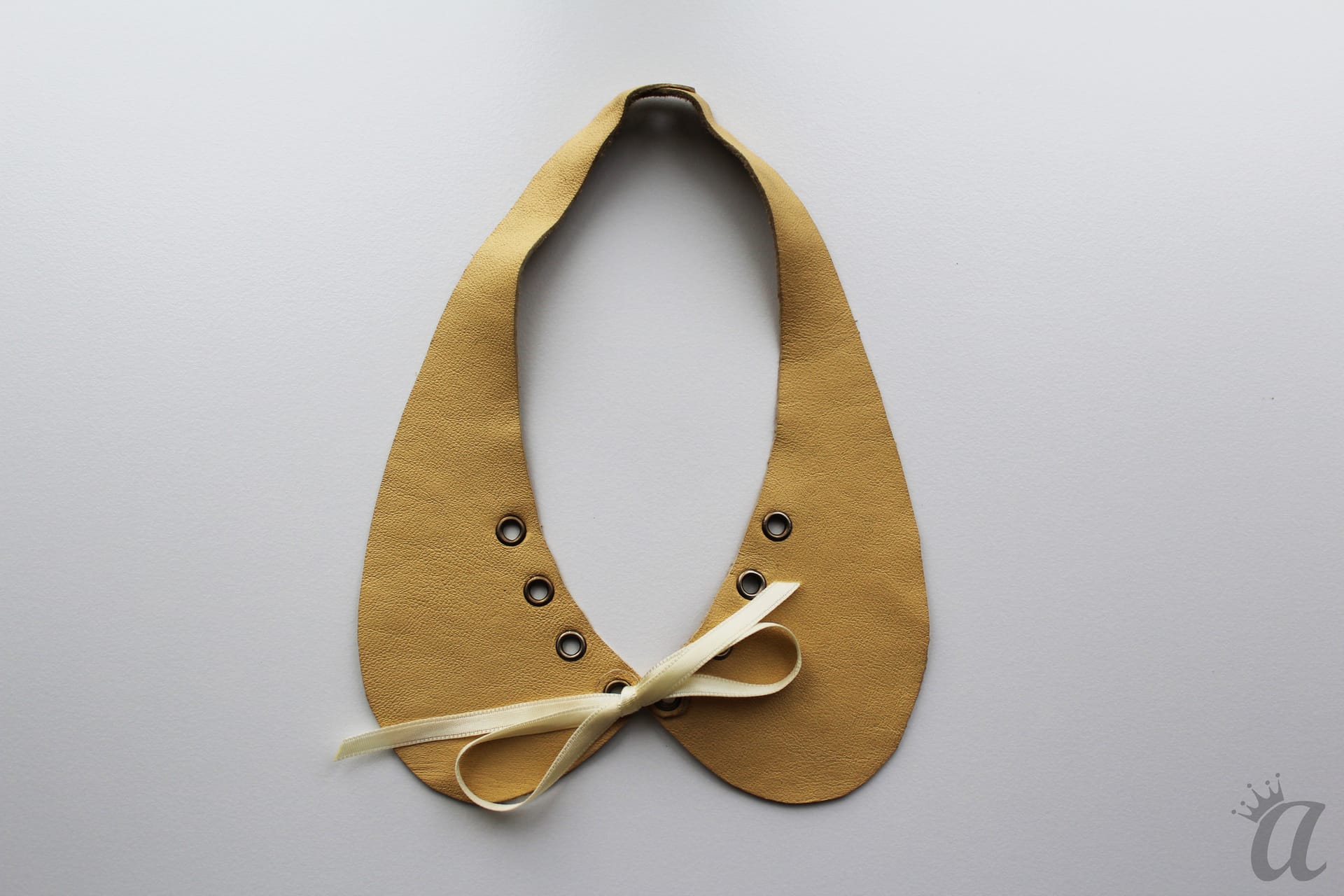 yellow leather necklace with bow